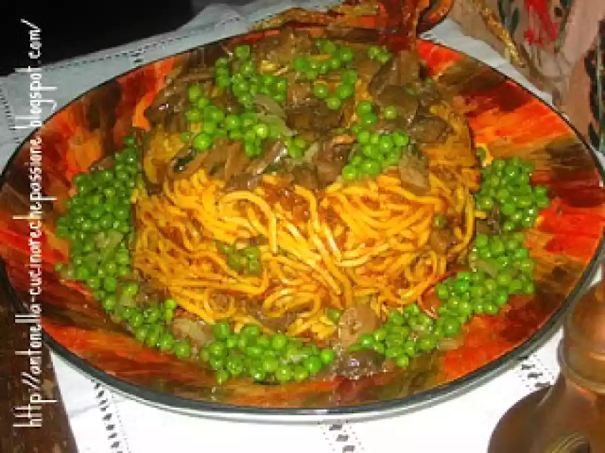 Timballo di tagliolini ai funghi porcini e piselli