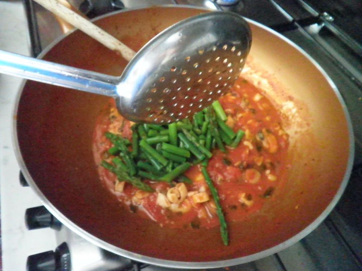 Torchietti al prezzemolo con frutti di mare e asparagi - foto 4