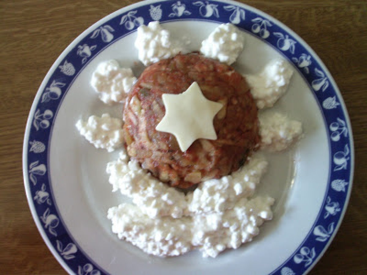 Tortino di melanzane con cuore filante e fiocchi di latte