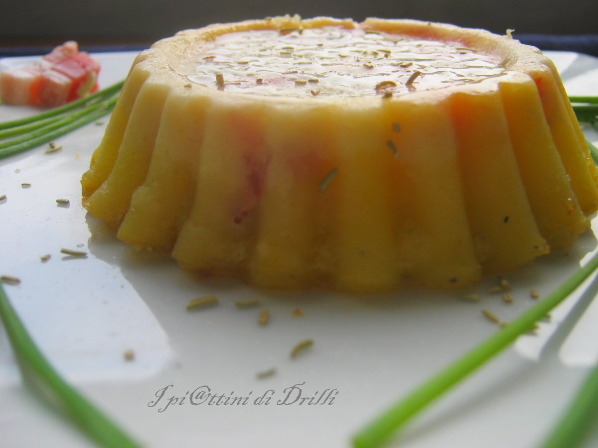 Tortino di patate e pancetta con colata di Brie