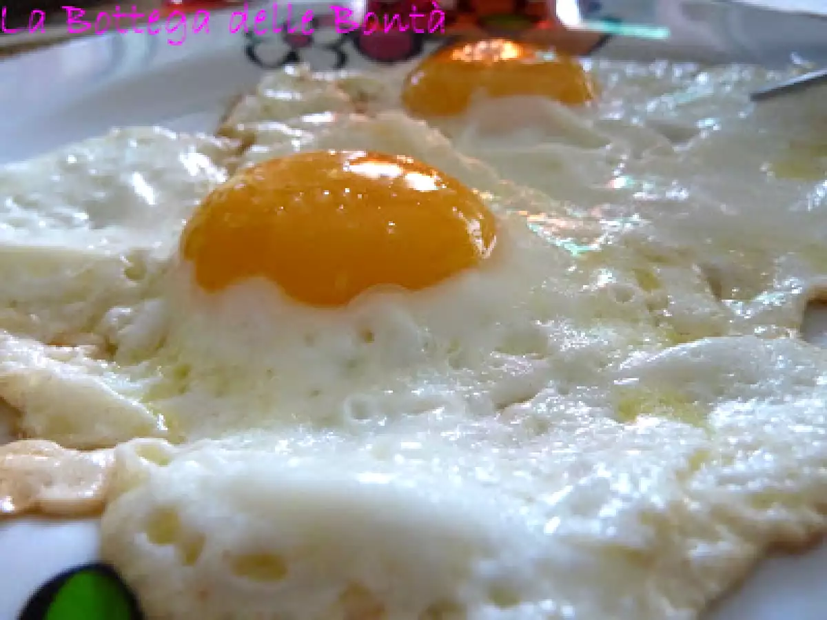 UOVA ALL'OCCHIO DI BUE AL BURRO TARTUFATO - foto 2